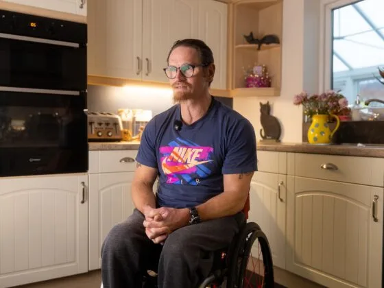 Our Client Ian in a wheelchair