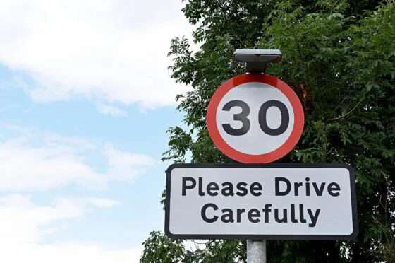 30mph sign asking drivers to drive carefully