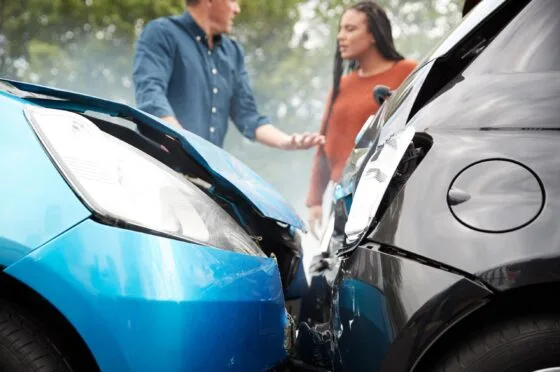 Damaged cars after road collision