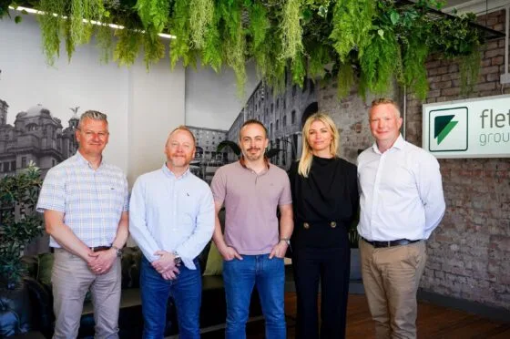 Fletchers Liverpool team standing outside office