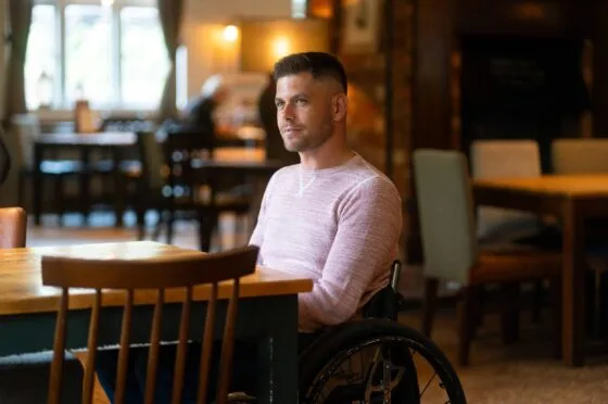 Gary in wheelchair in café