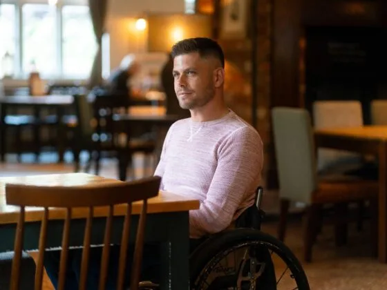Gary in wheelchair in café