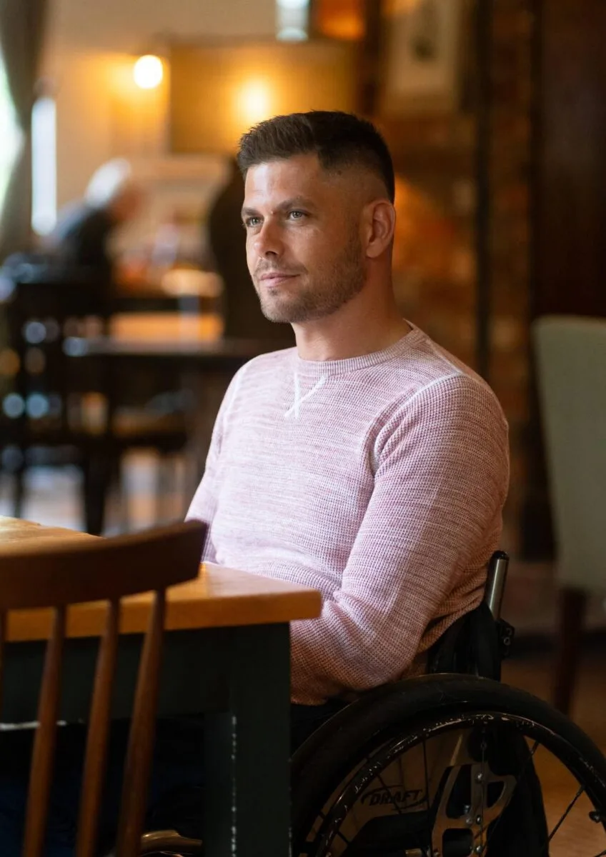 Gary in wheelchair in café