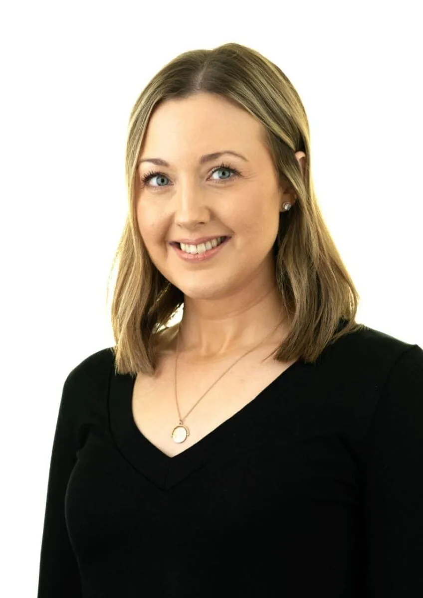 Hannah Luscombe smiling in professional headshot