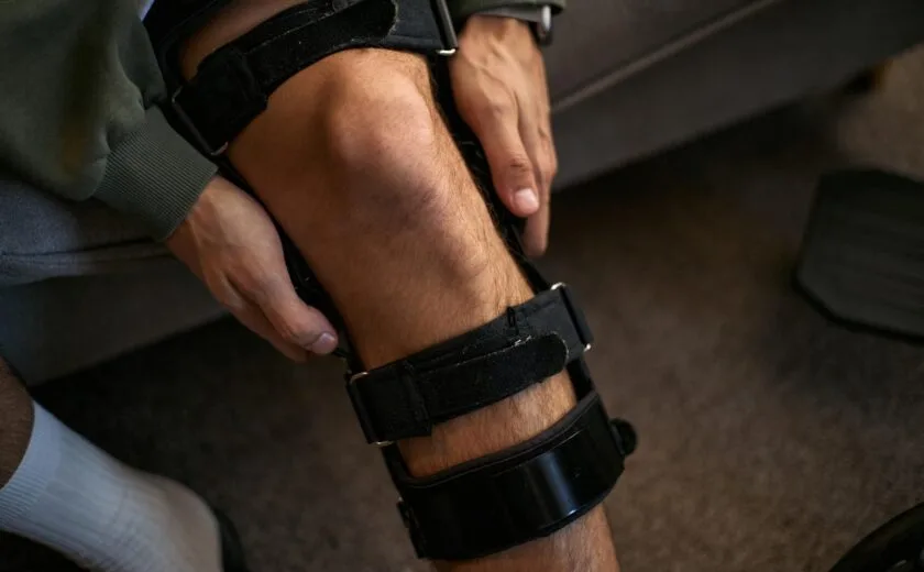 Man in knee brace