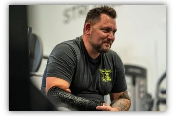 Man speaking in rehabilitation gym