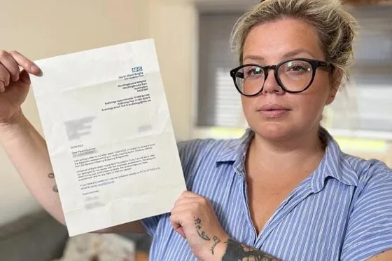 Natalie Brewell holding NHS letter