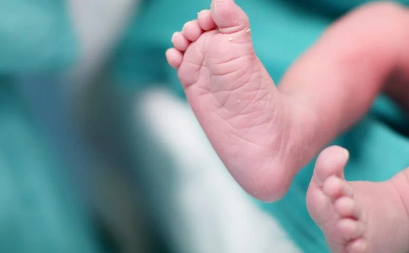Newborn baby's feet close-up
