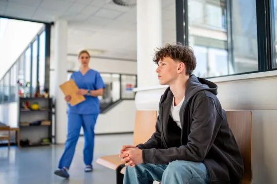 Patient waiting in hospital consultation area