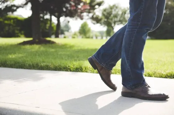 Person walking on pavement