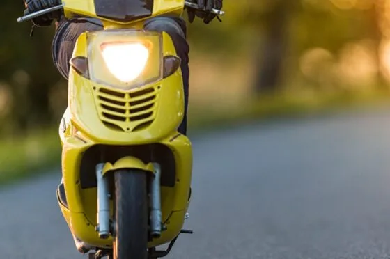 Scooter rider on road