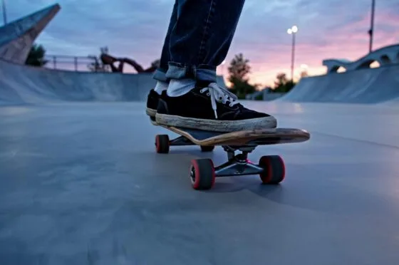 Skateboarder riding in skate park