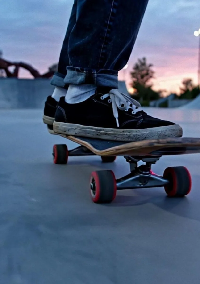Skateboarder riding in skate park