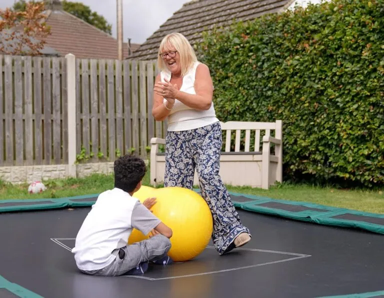 Michelle on the trampoline with Charlie
