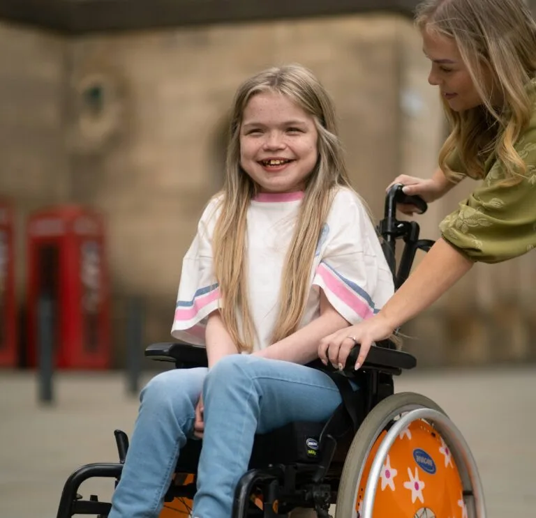 Ella in her wheelchair