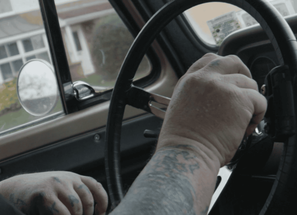 Robert driving his modified car