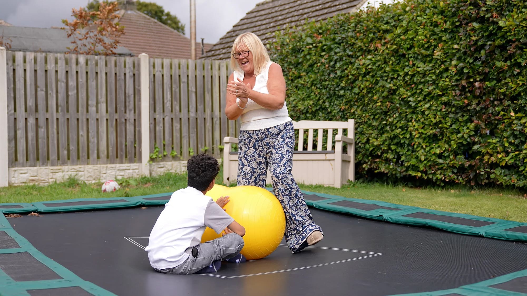 Michelle on the trampoline with Charlie