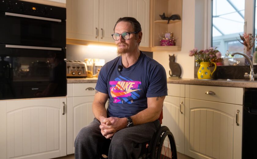 Our Client Ian in a wheelchair