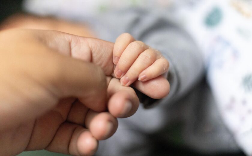 Baby holding hand