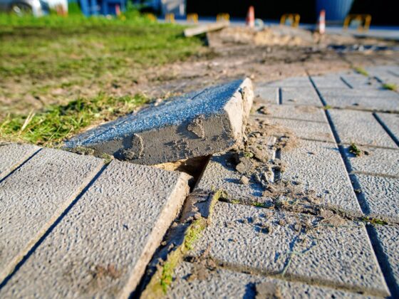 Broken paving slab causing trip hazard
