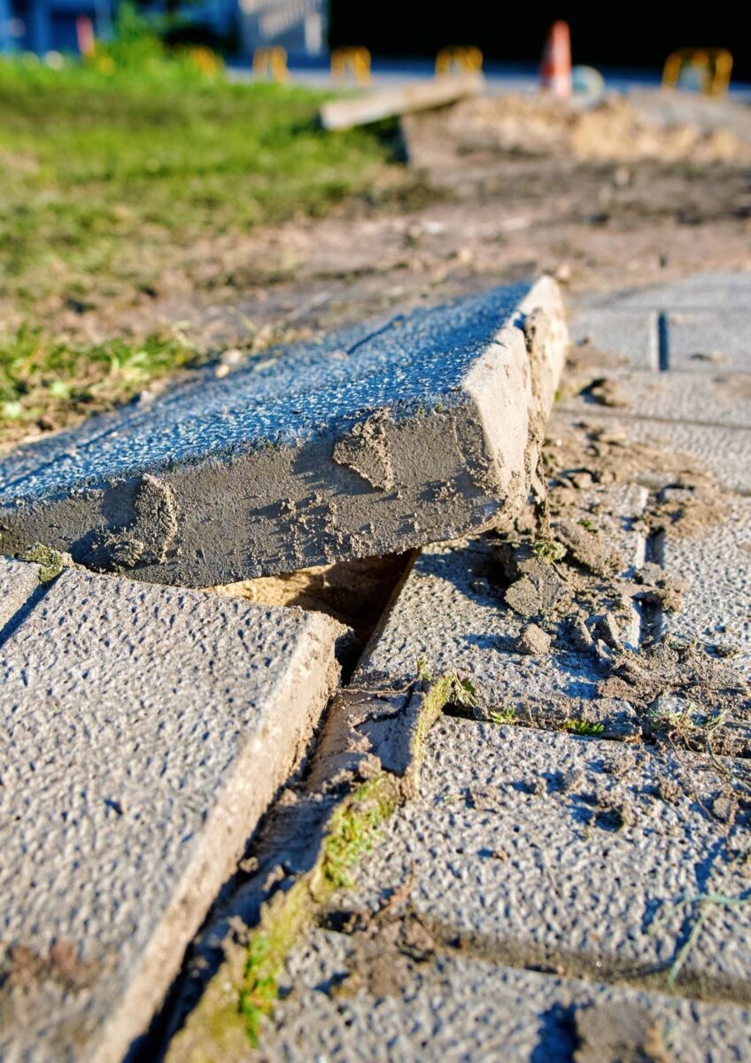 Broken paving slab causing trip hazard