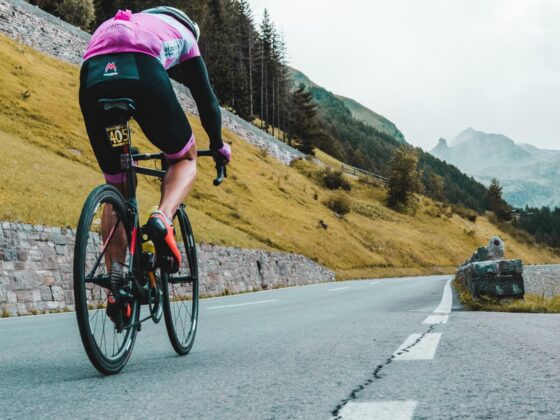Cyclist climbing mountain road
