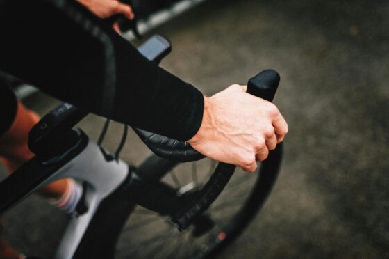 Cyclist's hand on brake lever