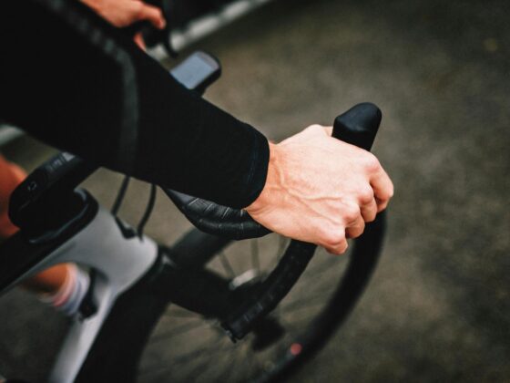 Cyclist's hand on brake lever