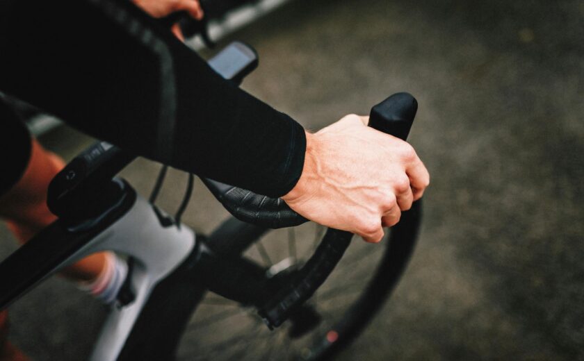 Cyclist's hand on brake lever