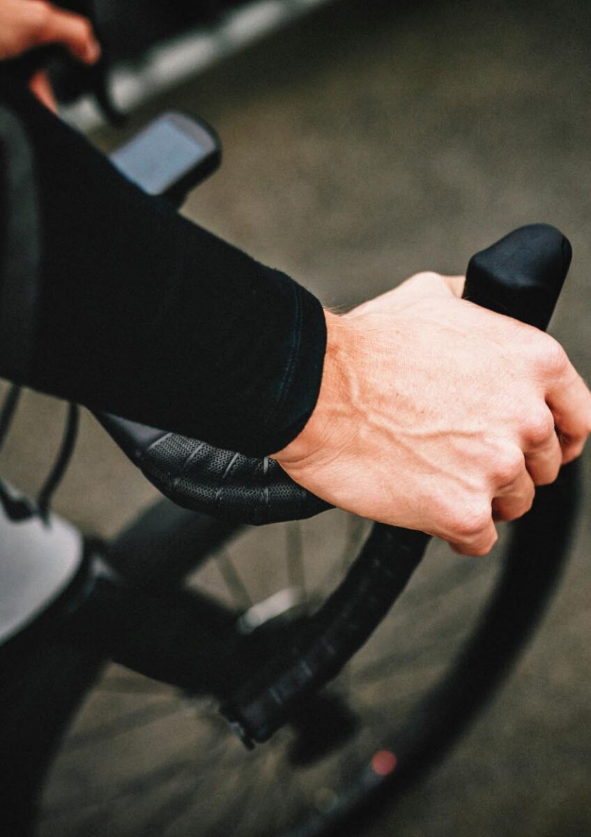 Cyclist's hand on brake lever