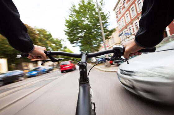 Cyclist's view riding through traffic