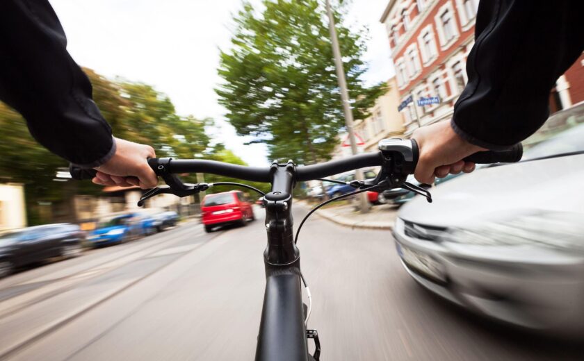 Cyclist's view riding through traffic