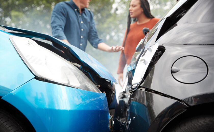 Damaged cars after road collision