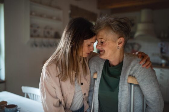 Daughter mum on crutches