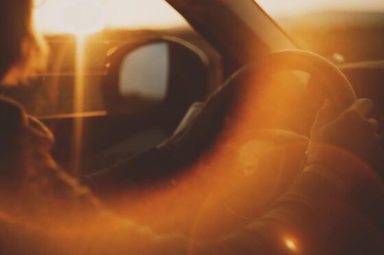 Driving car in sun