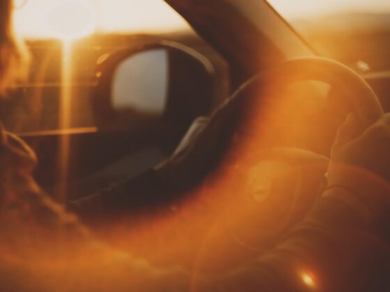Driving car in sun