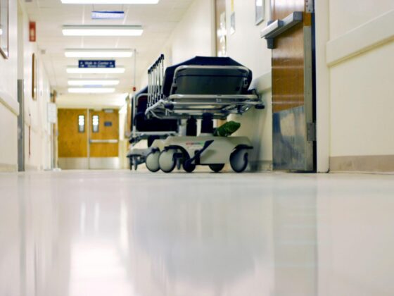 Empty hospital corridor with trolley