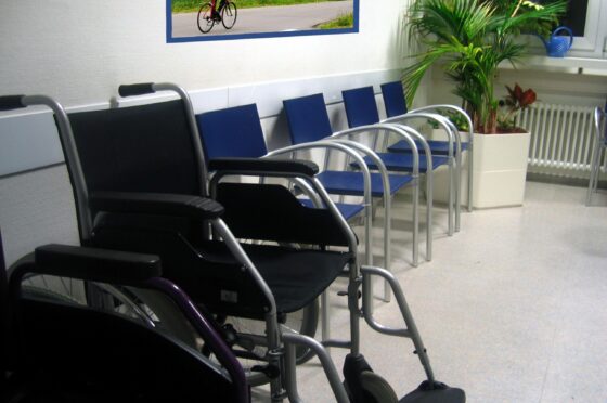 Empty hospital waiting area with wheelchairs