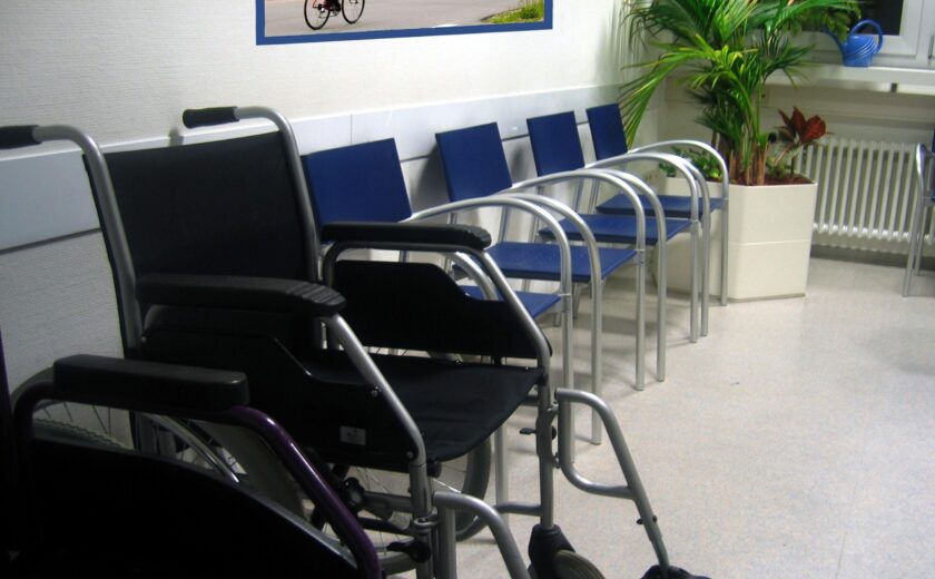 Empty hospital waiting area with wheelchairs