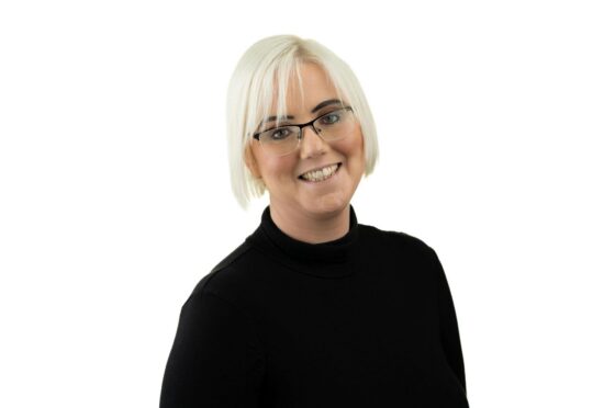 Francesca Paul smiling in professional headshot