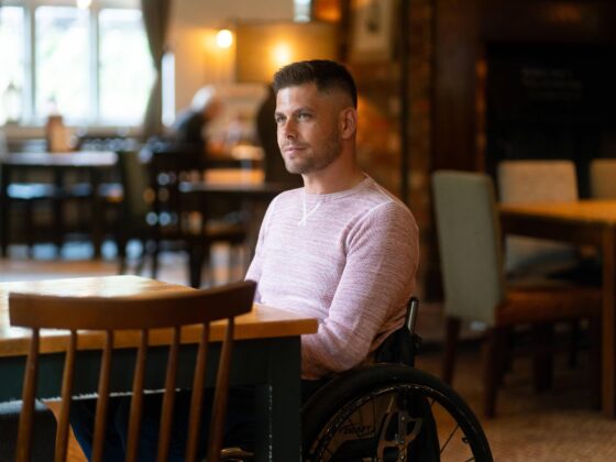 Gary in wheelchair in café