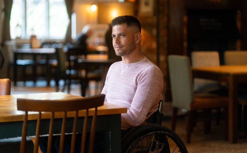 Gary in wheelchair in café