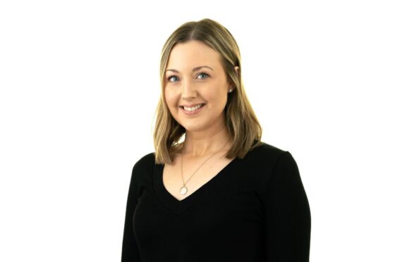 Hannah Luscombe smiling in professional headshot