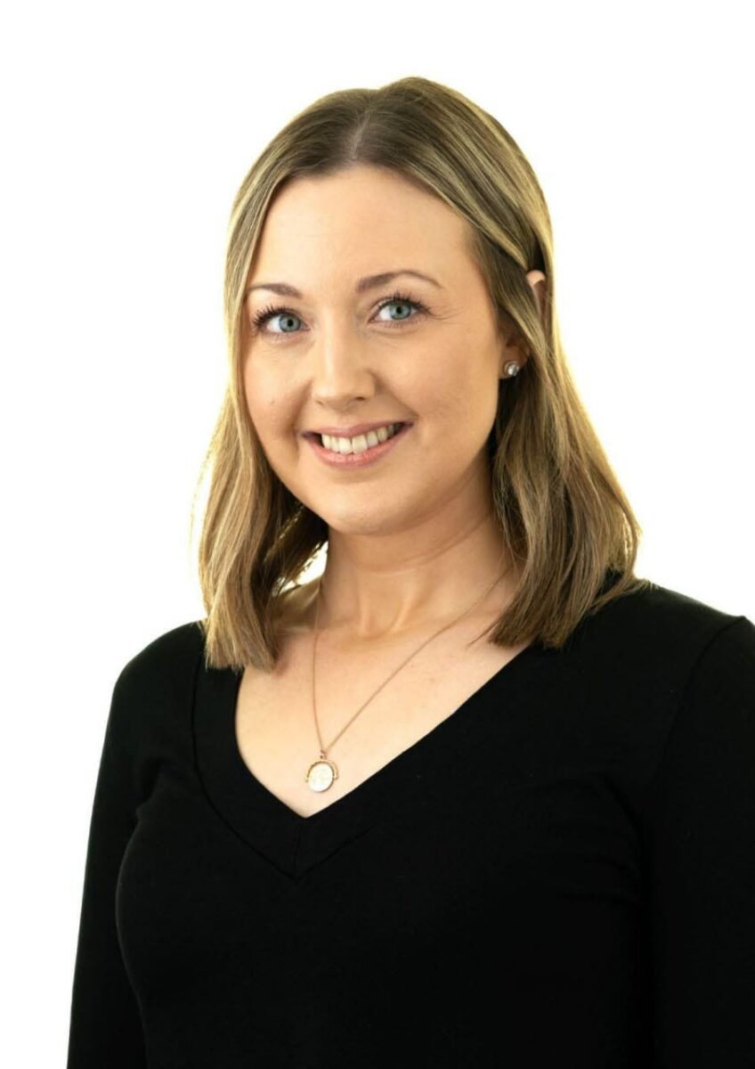 Hannah Luscombe smiling in professional headshot