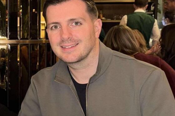 Ian Clifton seated in restaurant