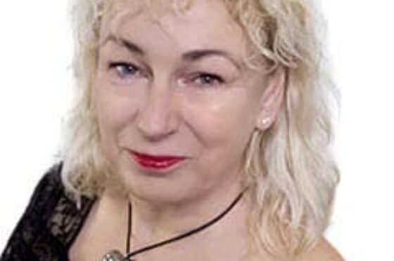 Julia Eyton smiling in professional headshot