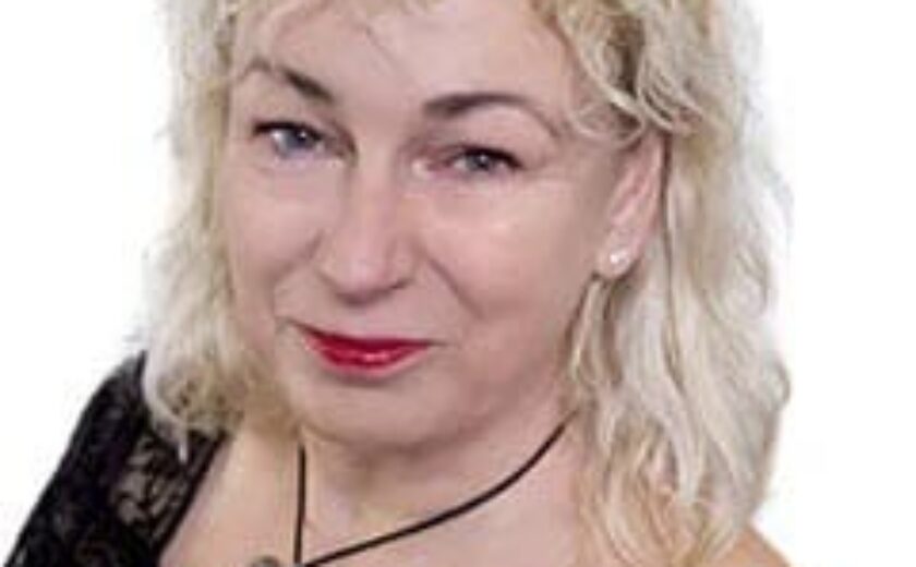 Julia Eyton smiling in professional headshot