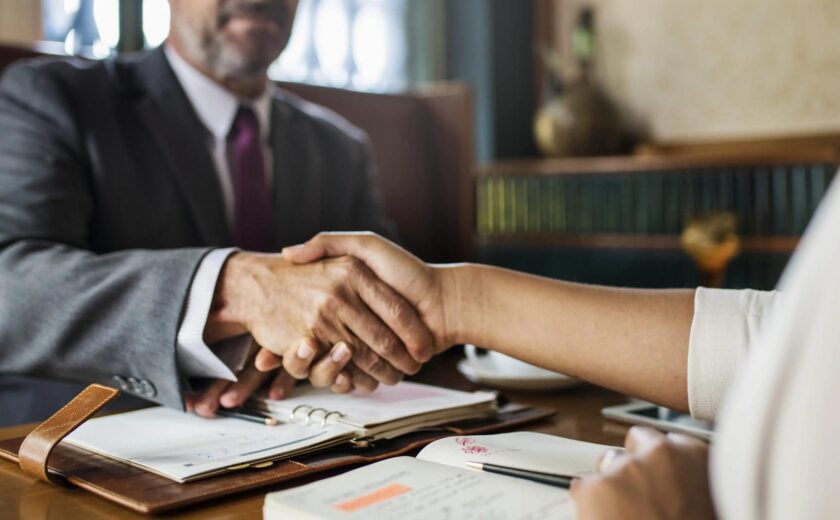 Lawyer reassuring client during consultation