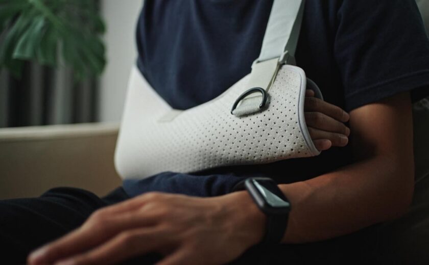 Man in arm brace