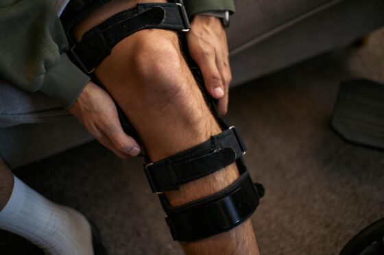 Man in knee brace